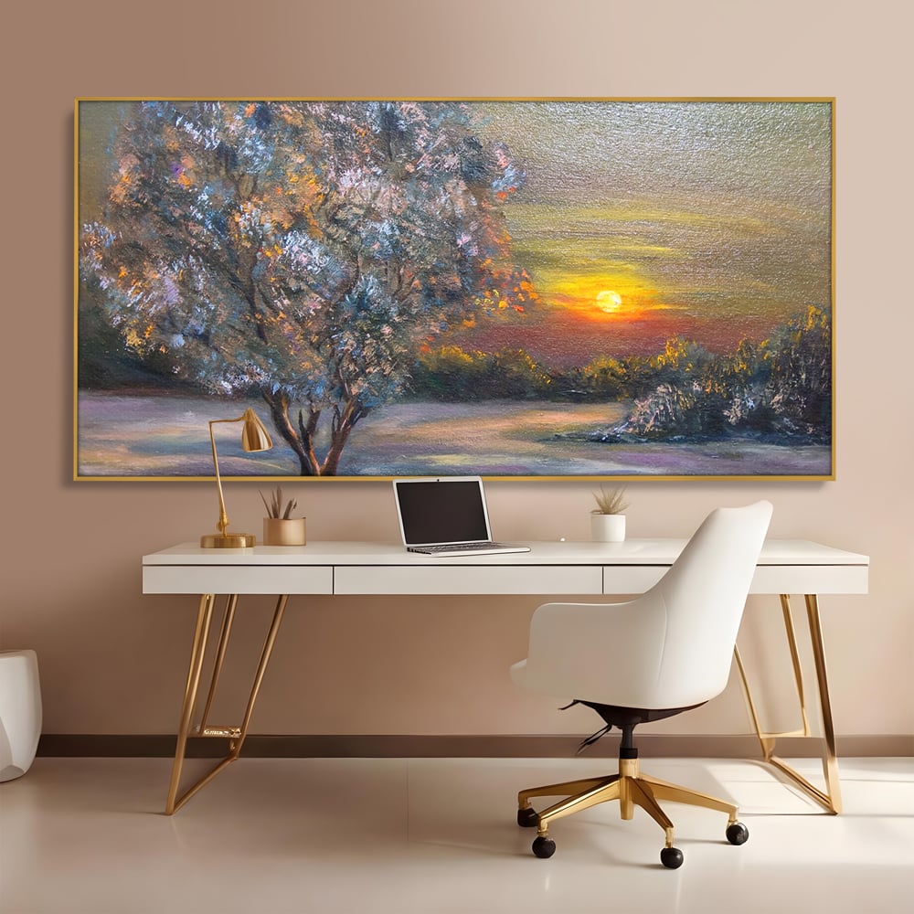 Tablou canvas cu pictura peisaj cu copac si apus, in rama de aluminiu auriu, pe perete intr-un birou